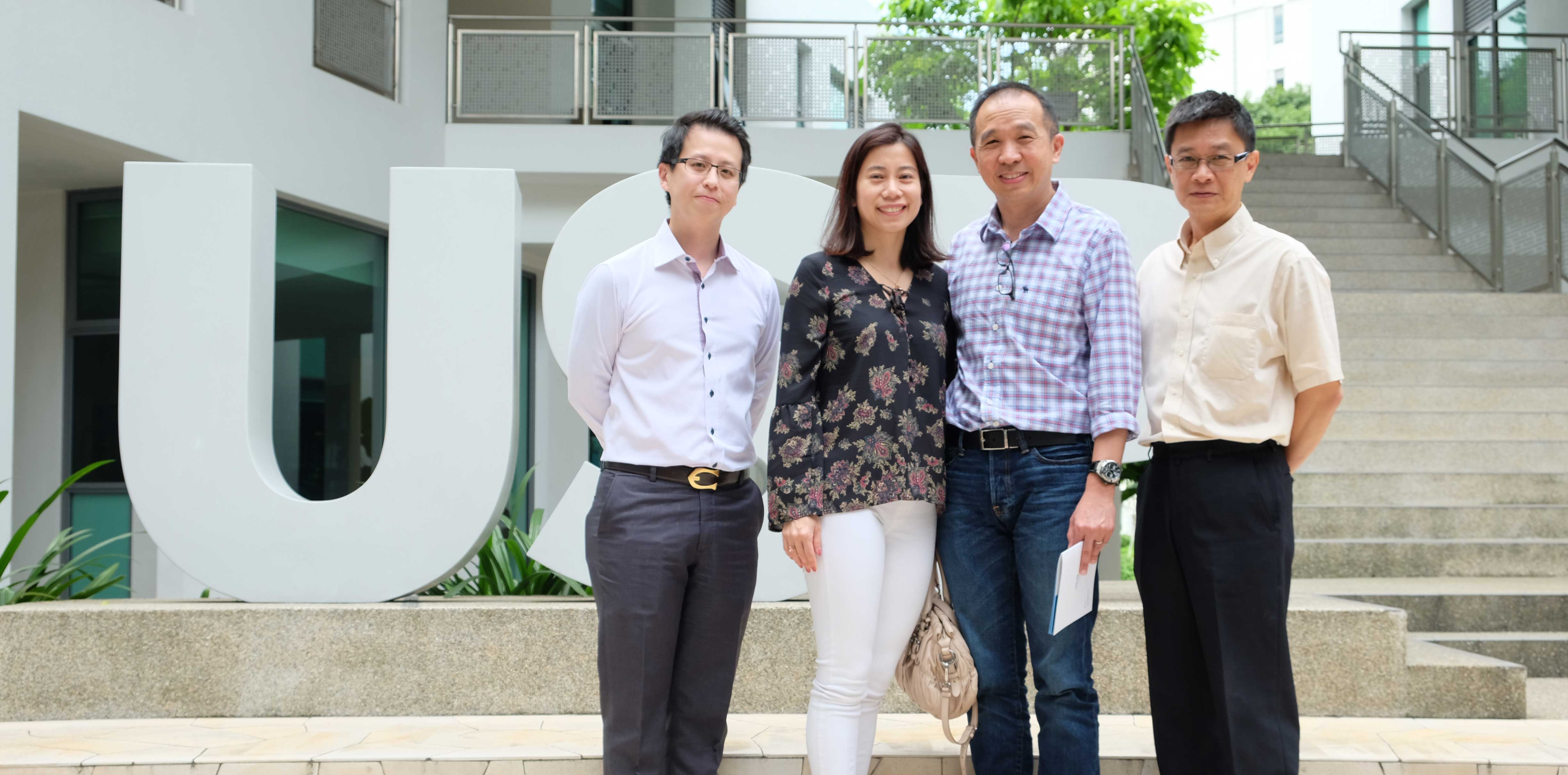 Donors Mdm Serene Siar and Mr Foo Jixun with Mr Landon Lim from NUS Development Office (left) and USP Director A/P Kang Hway Chuan (right)