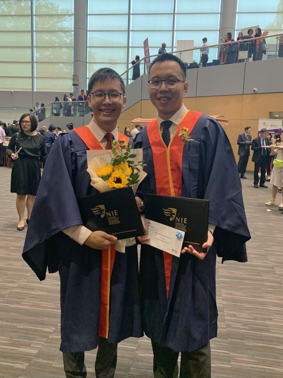 Andrea (L) and Yingjie (R) at NIE Teachers’ Investiture Ceremony.