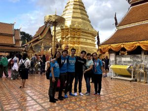 Students visiting the Doi Suthep Temple to see the locals engaging in religious ceremonies.